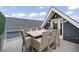 Rooftop deck features an outdoor dining table with seating and neighborhood views at 3540 Pecos St, Denver, CO 80211