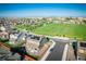 Aerial view of neighborhood near open space and parks in suburban setting at 16188 Elizabeth St, Thornton, CO 80602