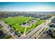 Masterfully planned community showcases a vast green space, playground, and tennis court amidst beautiful homes at 16188 Elizabeth St, Thornton, CO 80602
