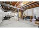 Unfinished basement featuring an open layout, exposed ceiling and a dedicated space for exercise equipment at 16188 Elizabeth St, Thornton, CO 80602