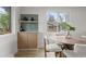 Stylish dining area with built-in cabinets and ample natural light at 4580 Garland St, Wheat Ridge, CO 80033