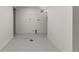 A basic laundry room with connections stands ready for new appliances and storage at 4580 Garland St, Wheat Ridge, CO 80033