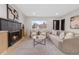 Stylish living room with modern decor, fireplace, and comfortable seating at 4580 Garland St, Wheat Ridge, CO 80033