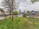 Fenced backyard featuring green grass at 11851 Elm Dr, Thornton, CO 80233