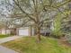 Inviting two-story home with a spacious two-car garage and mature tree at 11851 Elm Dr, Thornton, CO 80233