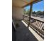 Enjoy the outside from the private deck with wood railing at 14751 E Tennessee Dr # 222, Aurora, CO 80012