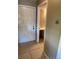 Tiled entryway showing the front door and a doorway leading to an adjacent room at 14751 E Tennessee Dr # 222, Aurora, CO 80012