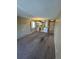 Open concept living space with large windows and a view into the kitchen at 14751 E Tennessee Dr # 222, Aurora, CO 80012