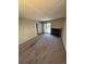 Inviting living room featuring a fireplace and access to outdoor deck at 14751 E Tennessee Dr # 222, Aurora, CO 80012