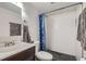 Modern bathroom featuring a tiled shower, updated sink, and stylish finishes at 9957 Grove Way # F, Westminster, CO 80031