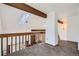 Loft area featuring a beam, skylight, and plush carpet flooring at 9957 Grove Way # F, Westminster, CO 80031