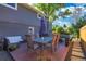 Inviting backyard deck with ample seating and an umbrella-shaded dining area, perfect for outdoor gatherings at 1750 E Noble Pl, Centennial, CO 80121