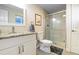 Updated bathroom with granite countertops, glass-enclosed shower, and modern fixtures for a clean and stylish look at 1750 E Noble Pl, Centennial, CO 80121