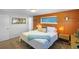 Bright bedroom with a comfortable bed, stylish decor, and ample natural light from a window at 1750 E Noble Pl, Centennial, CO 80121