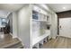 Well-organized mudroom area features built-in storage, bench seating, and a convenient layout at 1750 E Noble Pl, Centennial, CO 80121