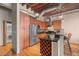 Well-equipped kitchen with stainless steel appliances, wood cabinetry, and a functional layout at 1800 Lawrence St # 303, Denver, CO 80202