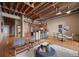 Open-concept living space with a modern kitchen, dining area, and comfortable seating at 1800 Lawrence St # 303, Denver, CO 80202
