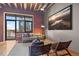 Comfortable living room with a balcony, modern furnishings, and large windows for city views at 1800 Lawrence St # 303, Denver, CO 80202
