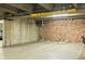 Parking space in a garage with clearance marked at 1800 Lawrence St # 303, Denver, CO 80202