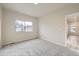 Bright bedroom featuring plush carpeting, a window with natural light and neutral wall paint at 844 W 128Th Pl, Westminster, CO 80234