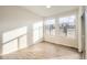 Bright bedroom filled with natural light from large windows, complemented by wood floors at 844 W 128Th Pl, Westminster, CO 80234