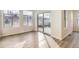 Bright living space with wood floors and sliding door to a deck. Natural light fills the room at 844 W 128Th Pl, Westminster, CO 80234