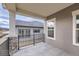 Covered patio showcasing stone pillars and a view of the house and backyard at 844 W 128Th Pl, Westminster, CO 80234