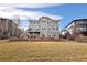 Spacious backyard with a large grassy area, perfect for outdoor activities and entertaining at 13507 W 87Th Ter, Arvada, CO 80005