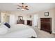 Spacious main bedroom features a vaulted ceiling and matching dark wood dressers at 13507 W 87Th Ter, Arvada, CO 80005