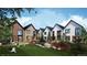 Beautiful row of modern homes with lush landscaping and outdoor living spaces at 5770 W 92Nd Ave, Westminster, CO 80031