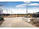 View of the baseball fields including a covered seating area and a fenced perimeter at 19709 Rosewood Ct, Parker, CO 80138