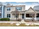 Inviting home exterior with covered porch and manicured landscaping; shows great curb appeal at 19709 Rosewood Ct, Parker, CO 80138
