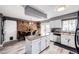 Bright eat-in kitchen featuring stainless steel appliances, granite countertops, and a center island at 19709 Rosewood Ct, Parker, CO 80138
