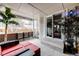 Outdoor patio with comfortable seating, lovely decor, and sliding door access to the home interior at 19709 Rosewood Ct, Parker, CO 80138