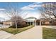 Exterior shot of the O'Brien Pool building with brick facade and covered entrance at 19709 Rosewood Ct, Parker, CO 80138
