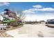 Exterior shot of a waterslide, lounge seating, pool cover, and surrounding buildings at 19709 Rosewood Ct, Parker, CO 80138