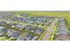 An aerial view of a neighborhood, showcasing the community's layout and surrounding landscape at 91 S Quantock St, Aurora, CO 80018