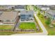 An aerial view showcasing the backyard, and landscaping of the home at 91 S Quantock St, Aurora, CO 80018