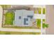 Aerial view of a home featuring solar panels, landscaping, and a well-maintained yard at 91 S Quantock St, Aurora, CO 80018