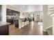 Modern kitchen featuring an island with bar seating and stainless steel appliances at 91 S Quantock St, Aurora, CO 80018