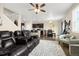 Open-concept living space with a modern kitchen and comfortable seating at 91 S Quantock St, Aurora, CO 80018