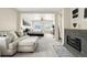 Spacious main bedroom with a fireplace and a comfortable sitting area at 91 S Quantock St, Aurora, CO 80018
