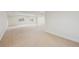 Spacious basement with neutral carpet, white walls, and recessed lighting at 2502 Alton St, Denver, CO 80238