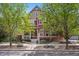 Charming two-story home with inviting front porch and well-maintained landscaping at 2502 Alton St, Denver, CO 80238
