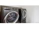 Side-by-side washer and dryer set in a neutral-toned laundry space, ready for convenient laundry days at 2502 Alton St, Denver, CO 80238