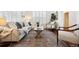 Cozy living room featuring stylish furnishings, area rug, and ample natural light at 2502 Alton St, Denver, CO 80238