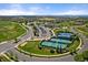 Aerial shot of community featuring tennis courts, golf course, and lush landscaping at 22725 E Long Dr, Aurora, CO 80016