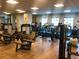 Well-equipped gym with various exercise machines and large windows at 22725 E Long Dr, Aurora, CO 80016