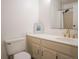 Bright bathroom featuring a white vanity, gold hardware, and a shower with white tile at 1625 Larimer St # 1001, Denver, CO 80202