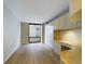 Bedroom with built-in desk, shelving, and large windows at 1625 Larimer St # 1001, Denver, CO 80202